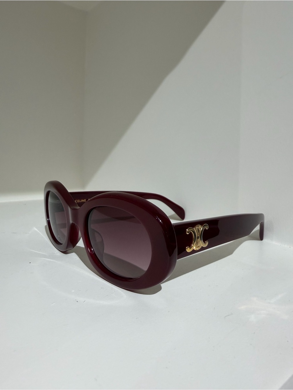 Celine Triomphe Oval Sunglasses in Milky Burgundy